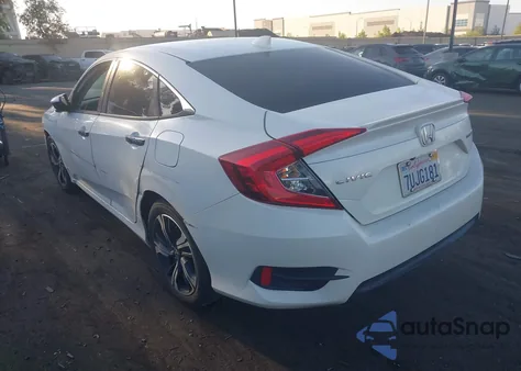 2017 Honda Civic Touring from USA, damaged, VIN 2HGFC1F9XHH658317